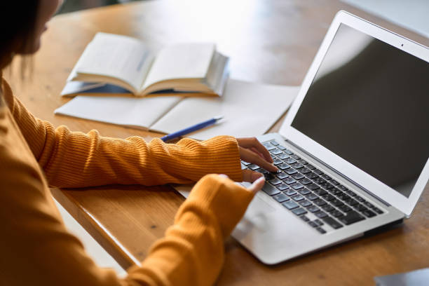 Learner viewing Vanderbilt course information on a laptop